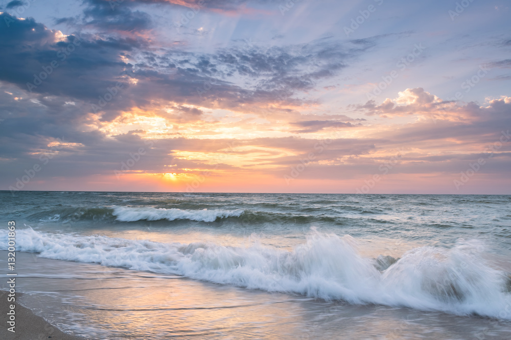 Fototapeta premium Landscape with Sunrise over Sea