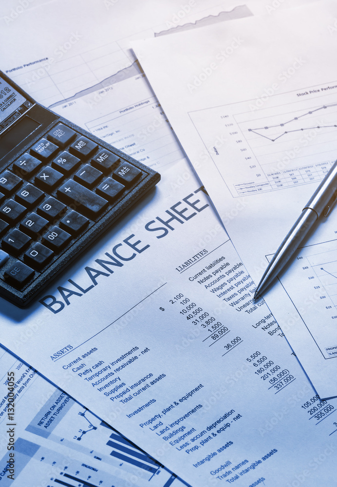 Image of a businessman workplace with papers Image of a businessman workplace with papers