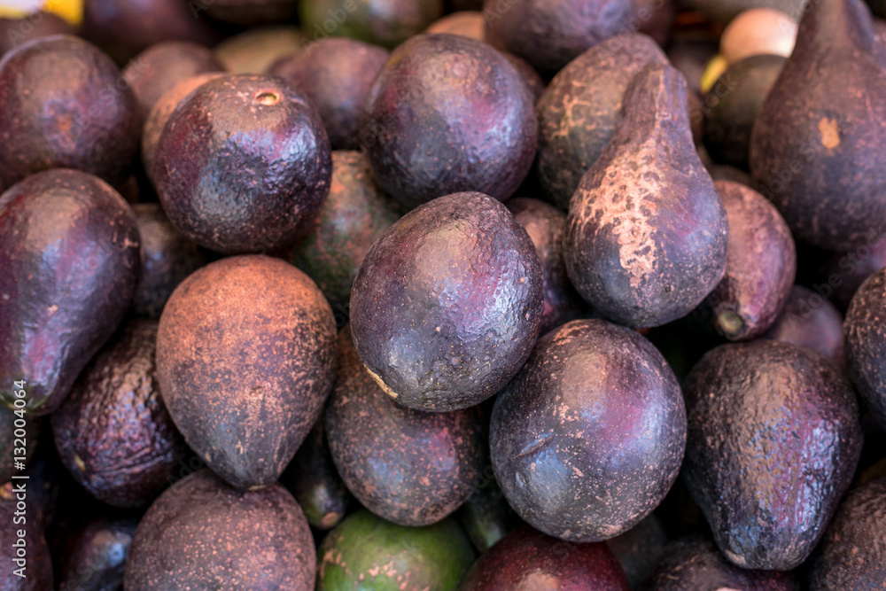Obraz premium Close up of black avocados, ready to eat.