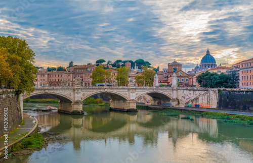 View of St. Peter’s Basilica over Tiber at sunset