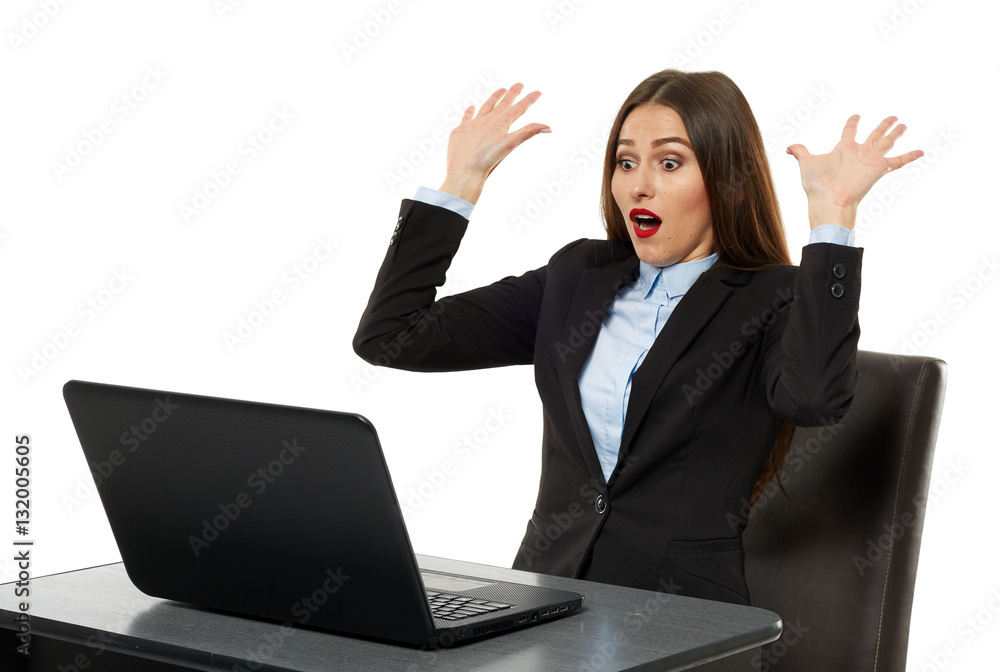 Frustrated young businesswoman at her laptop Frustrated young businesswoman at her laptop