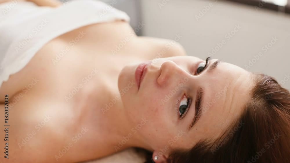 Woman is waiting for skin care treatment Woman is waiting for skin care treatment