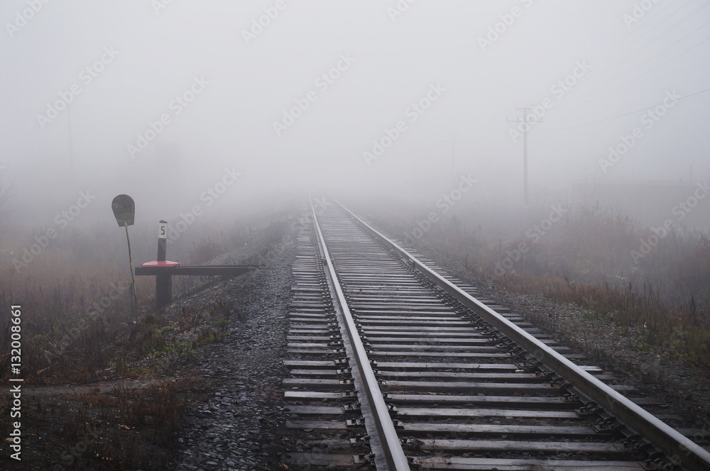Rails in the fog.