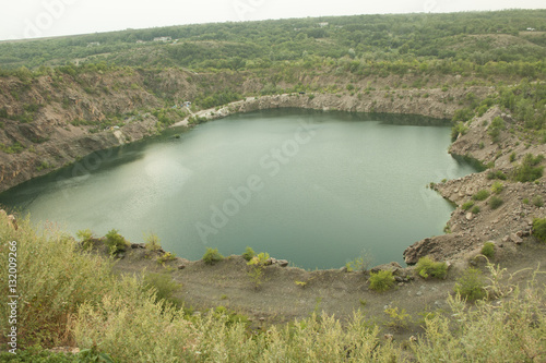 Deep lake in place of the mining pit.