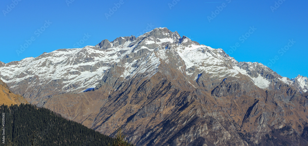 Great landscape on the Orobie Alps in winter season close to Cardeto natural lakes. View of the highest mountains including Pizzo Coca. Seriana Valley, Bergamo, Italy. 
