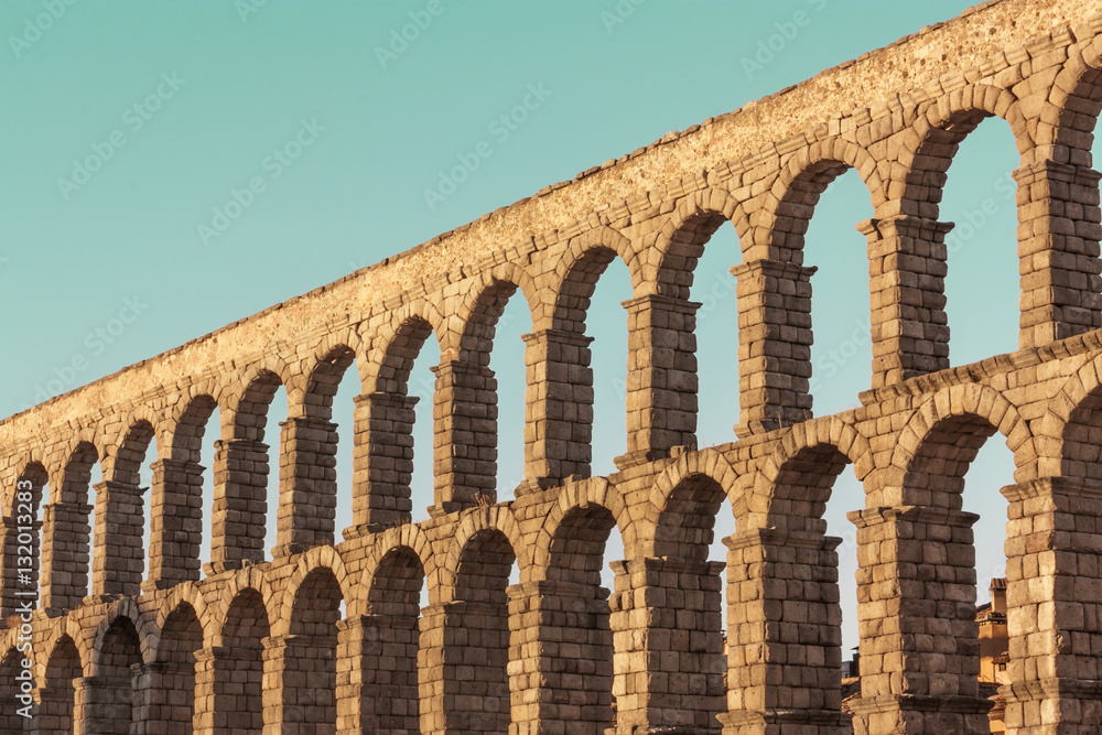 Photo of ancient Roman aqueduct in Segovia, Spain Photo of ancient Roman aqueduct in Segovia, Spain