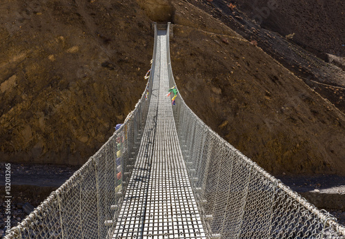 Fototapeta Naklejka Na Ścianę i Meble -  suspension bridge Himalayas Nepal.