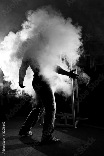 muscular man and abstract smoke