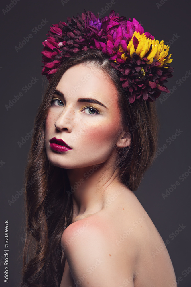 Beautiful girl with flowers on head Beautiful girl with flowers on head
