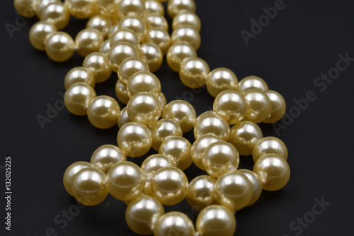 Many pearls with black background.