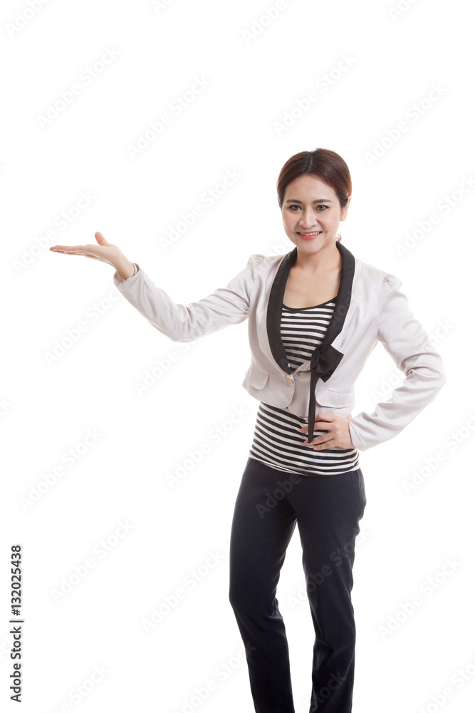 Young Asian business woman present with her hand. Young Asian business woman present with her hand.