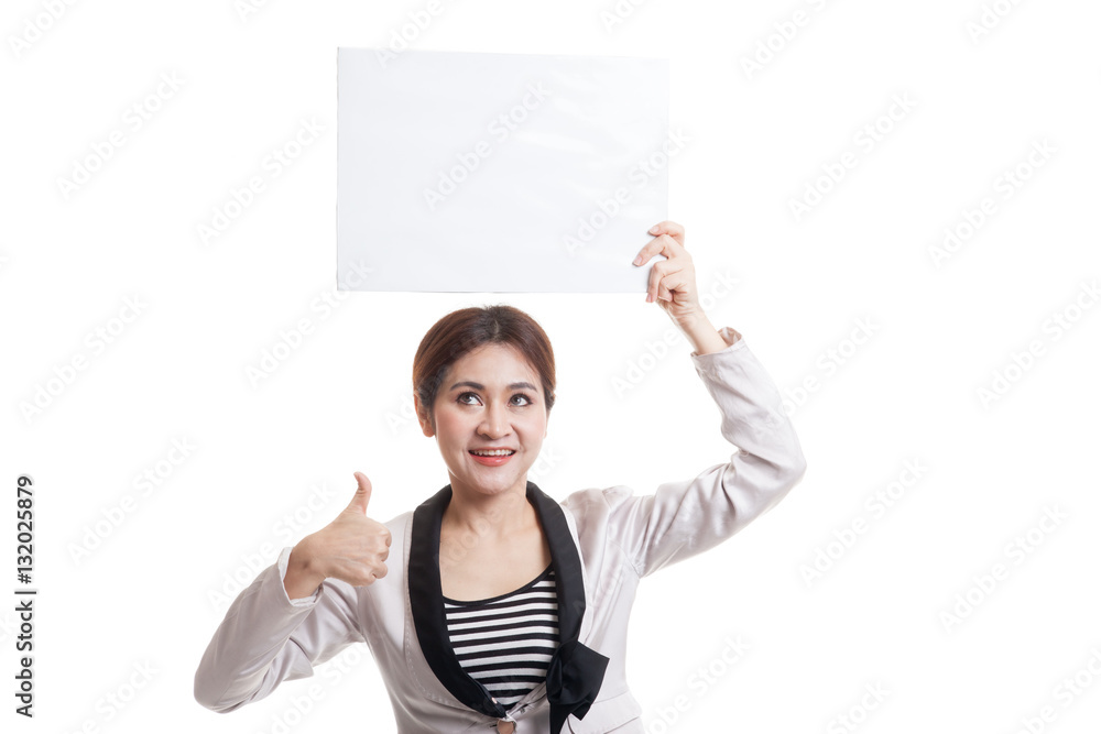 Young Asian business woman show thumbs up with white blank sign Young Asian business woman show thumbs up with white blank sign