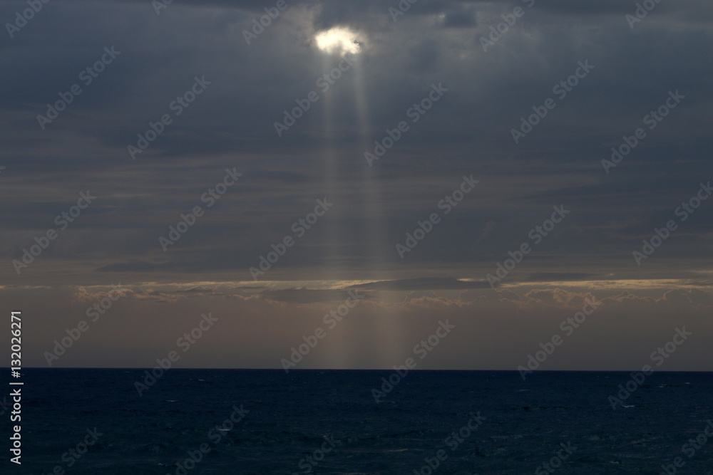 Very nice sunset , cloudy sky, sun ray in the sea of clouds