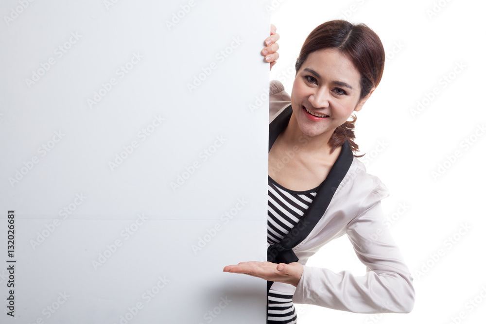 Young Asian woman present blank sign with palm hand. Young Asian woman present blank sign with palm hand.