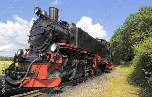 Steam train on island Rugen in Germany