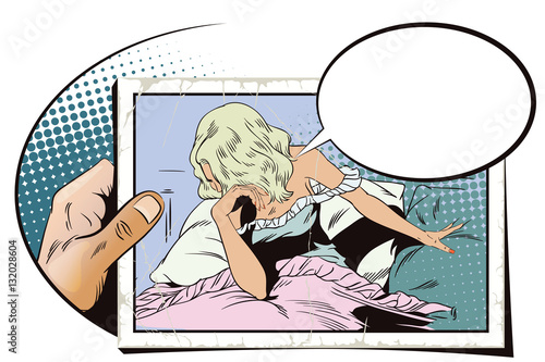 Sad girl in bed. Hand with photo.