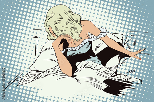 Sad girl in bed.