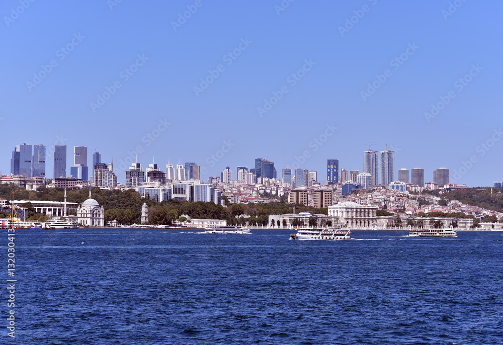 View of the Dolmabahce Mosque, Clock Tower  and Palace from Bosphorus, Istanbul