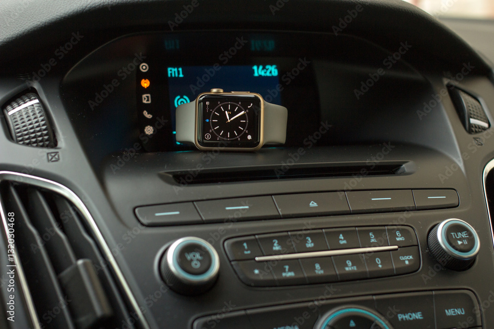 Fototapeta premium Smart watch on car dashboard