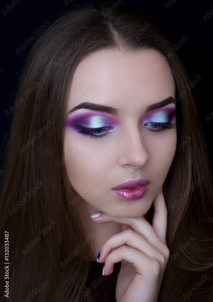 Professional makeup. Portrait of a girl. The blue eyes of the girl. Professional makeup. Portrait of a girl. The blue eyes of the girl.