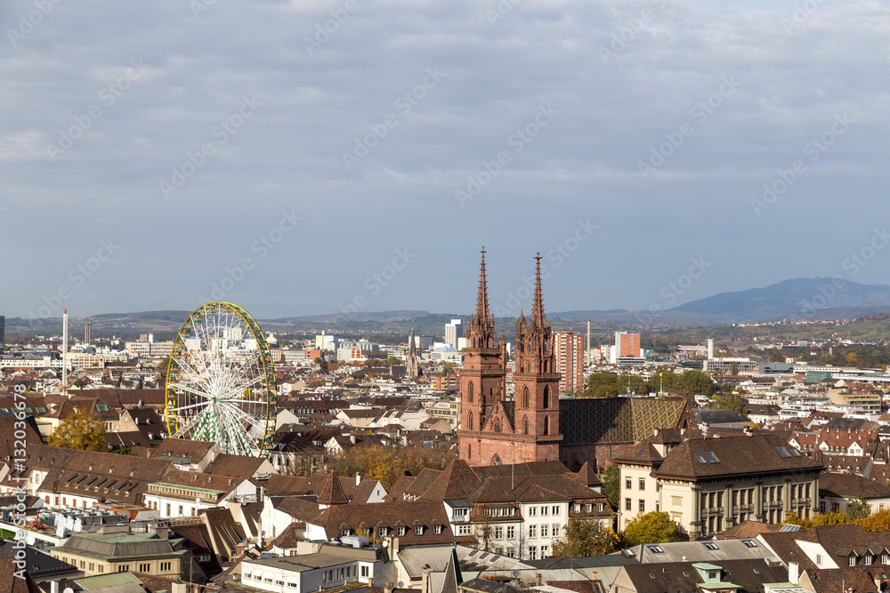 Basel skyline view with Minster and ferris wheel