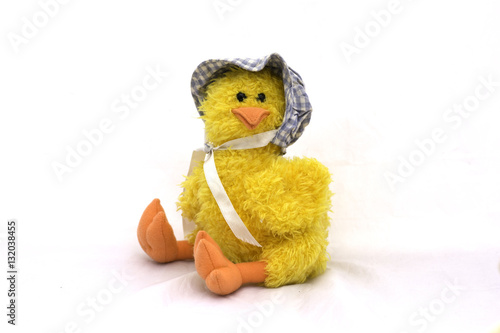white stuffed animal duck toy on a white background .