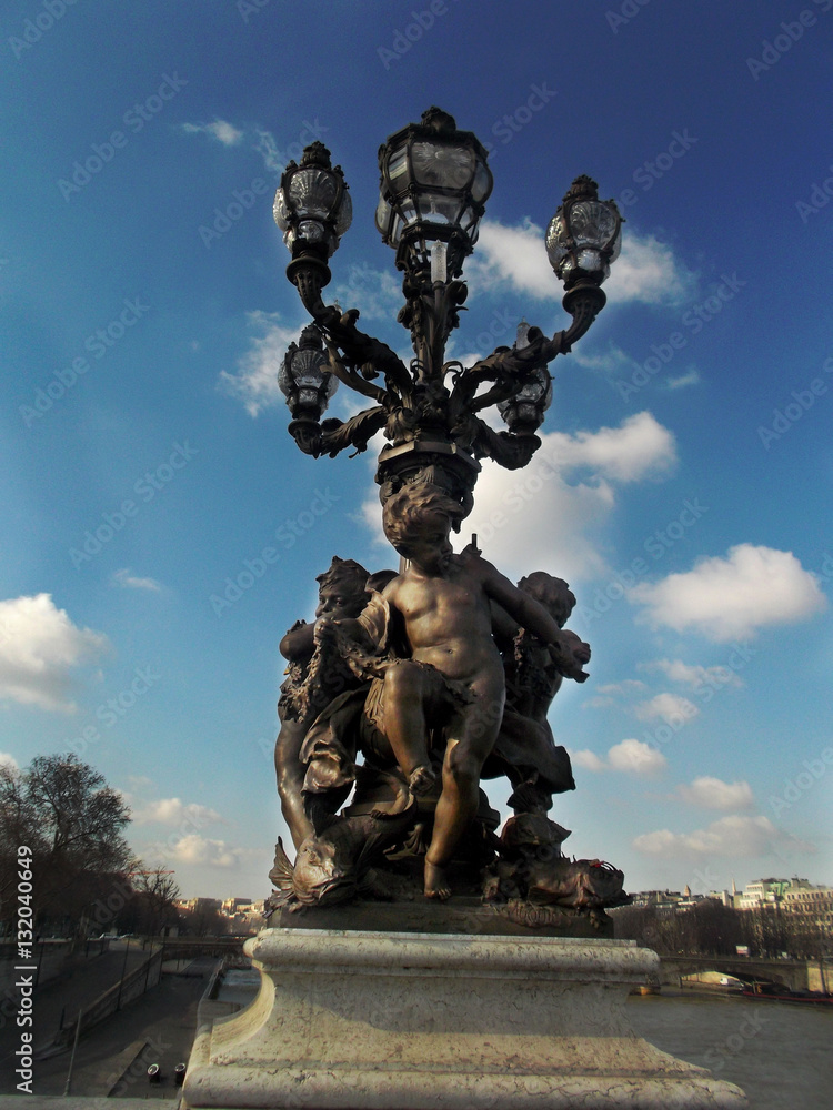 statue of angels on the bridge in paris