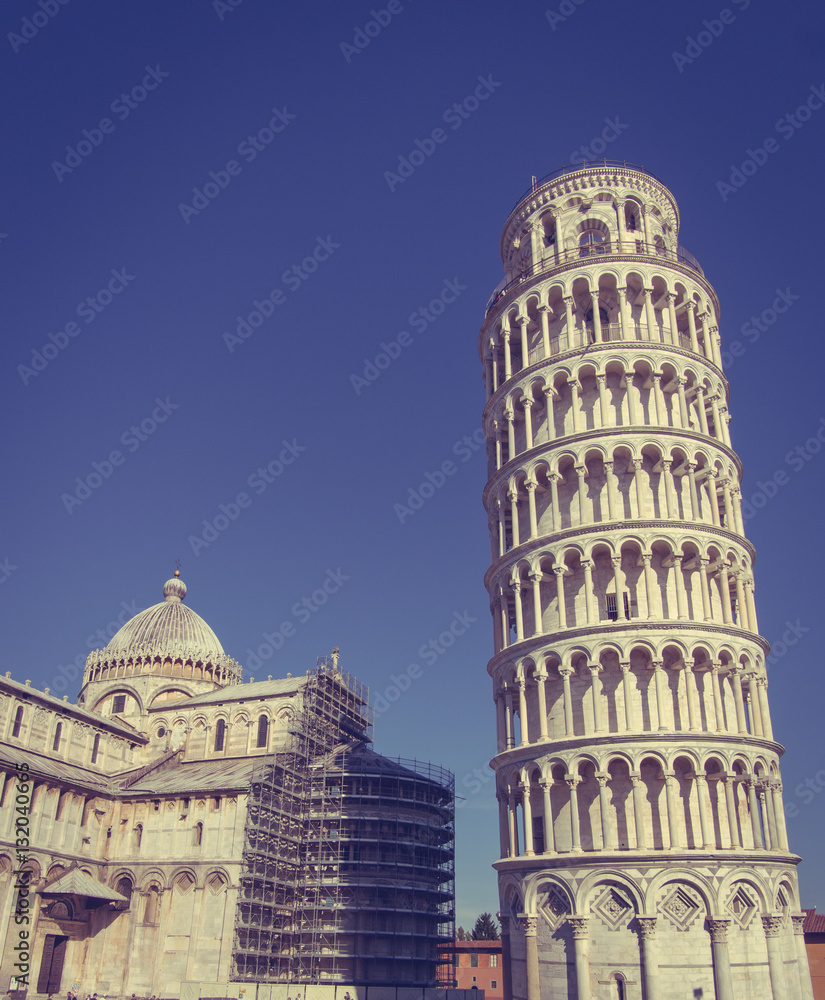 Building besides the leaning tower of Pisa. (vintage style)