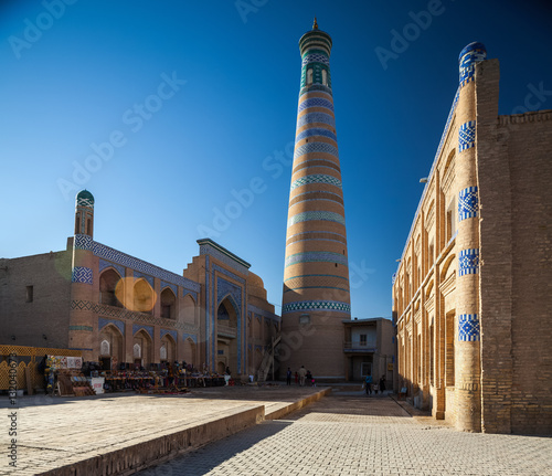 Islom Xoja complex in the city of Khiva at sunny day. Uzbekistan photo