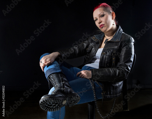 Slika na platnu Sitting informal woman with red hair