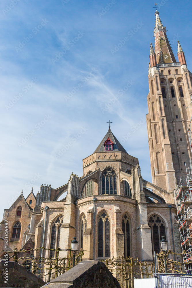 Medieval Church of Our Lady in Bruges in sunny day, Belgium