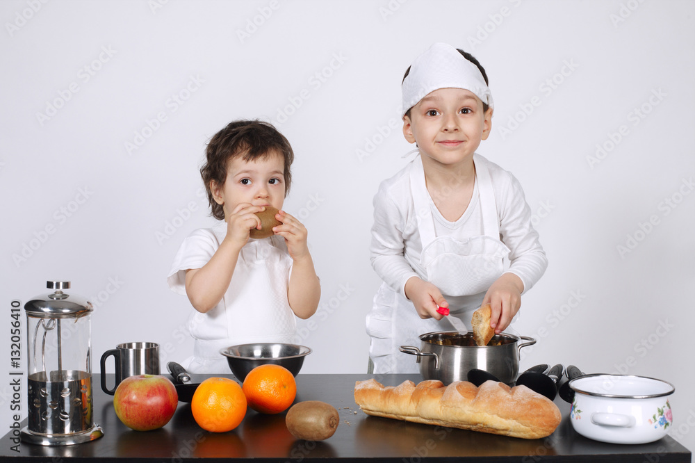 brothers making cake in the kitchen brothers making cake in the kitchen