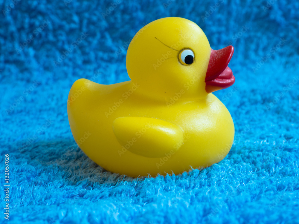 Rubber duck sitting on a towel. Rubber duck sitting on a towel.