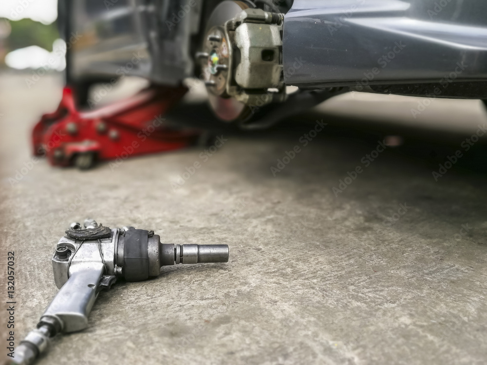 screwing mechanic object at garage