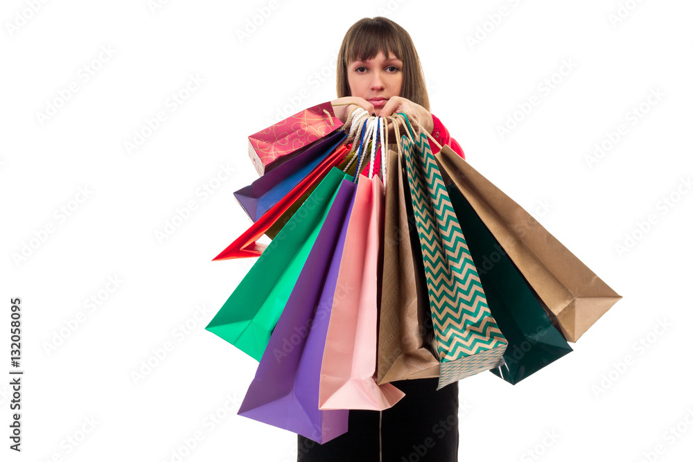 Shopping purchases, many colorful paper bags, packages in female