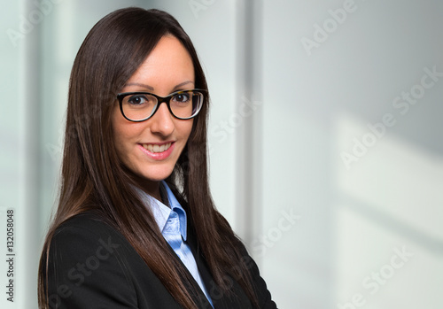 Young businesswoman in her office
