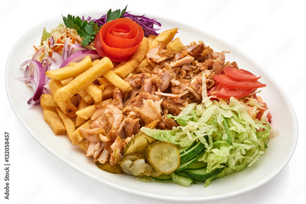 Doner kebab on a plate with french fries and salad Stock Photo | Adobe Stock