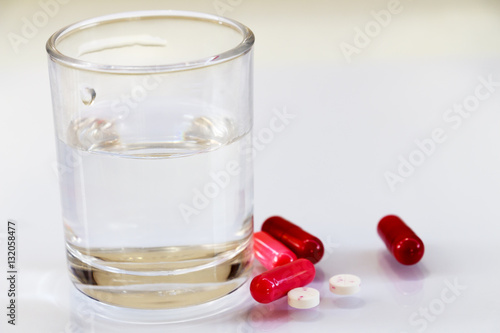 Tablets for the treatment of drinking water on a white background.