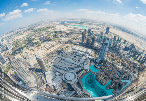 Photography Downtown Dubai and artificial lakes - Aerial view with fisheye l