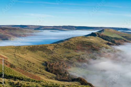 Scenic view across the great ridge srrounded in mist at the peak of Mam Tor in the Peak District, Hope Valley © Muessig