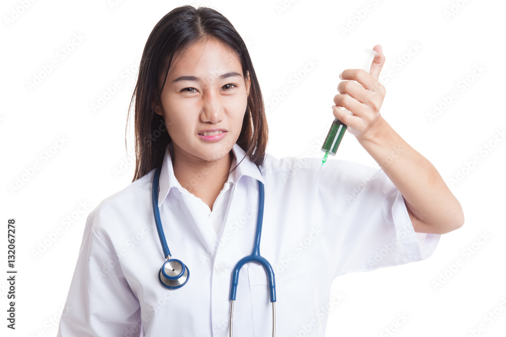 Crazy Young Asian female doctor hold a syringe. Crazy Young Asian female doctor hold a syringe.