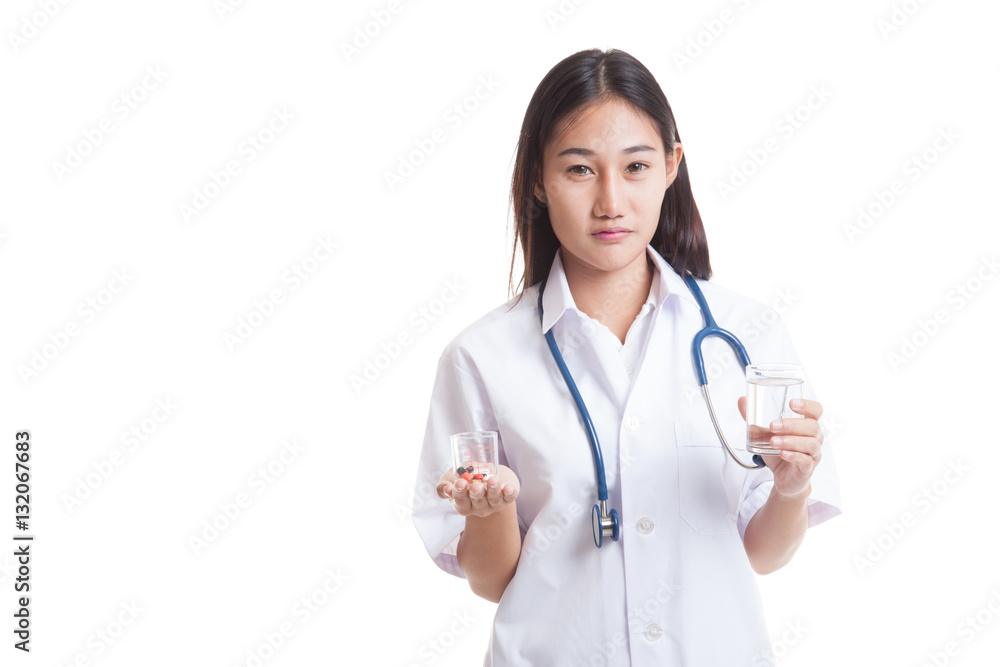 Young Asian female doctor with water and medicine. Young Asian female doctor with water and medicine.