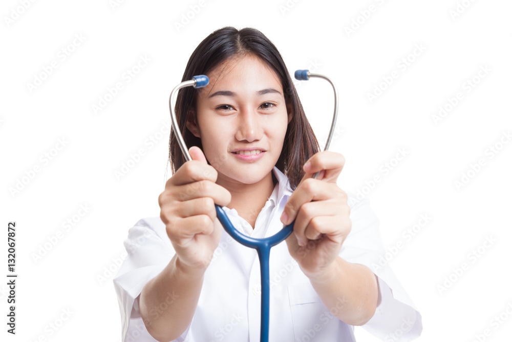 Young Asian female doctor show stethoscope focus at stethoscope. Young Asian female doctor show stethoscope focus at stethoscope.