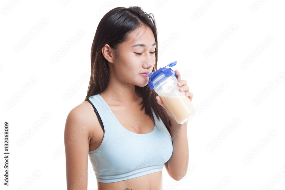Beautiful Asian healthy girl drinking whey protein. Beautiful Asian healthy girl drinking whey protein.