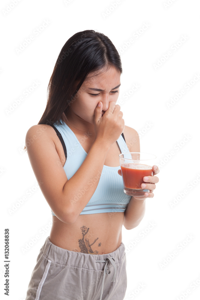 Beautiful healthy Asian girl hate tomato juice. Beautiful healthy Asian girl hate tomato juice.