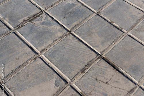 concrete tile for outdoor use Sidewalks, non-slip and wear resistance paving with tile Dirty and broken hydraulic tiles, pattern detail
