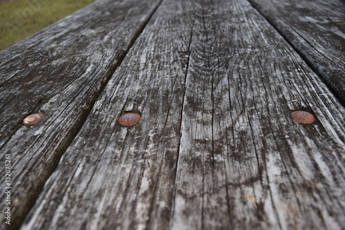 Weathered Wooden Planks with Rusty Nails 