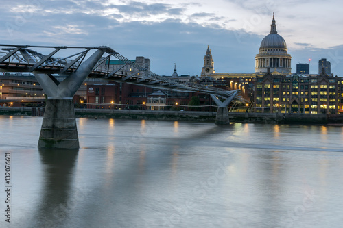 LONDON, ENGLAND - JUNE 17 2016: Twilight panorama of  Millennium Bridge and  St. Paul Cathedral, London, Great Britain