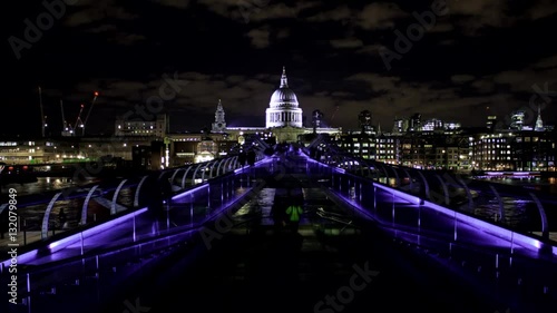 People crossing Millennium Bridge at night - London time-lapse