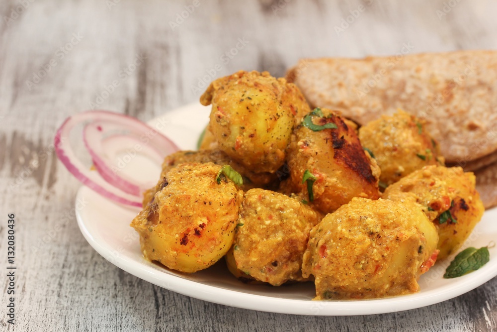 Dum aloo / Potato curry, selective focus Dum aloo / Potato curry, selective focus